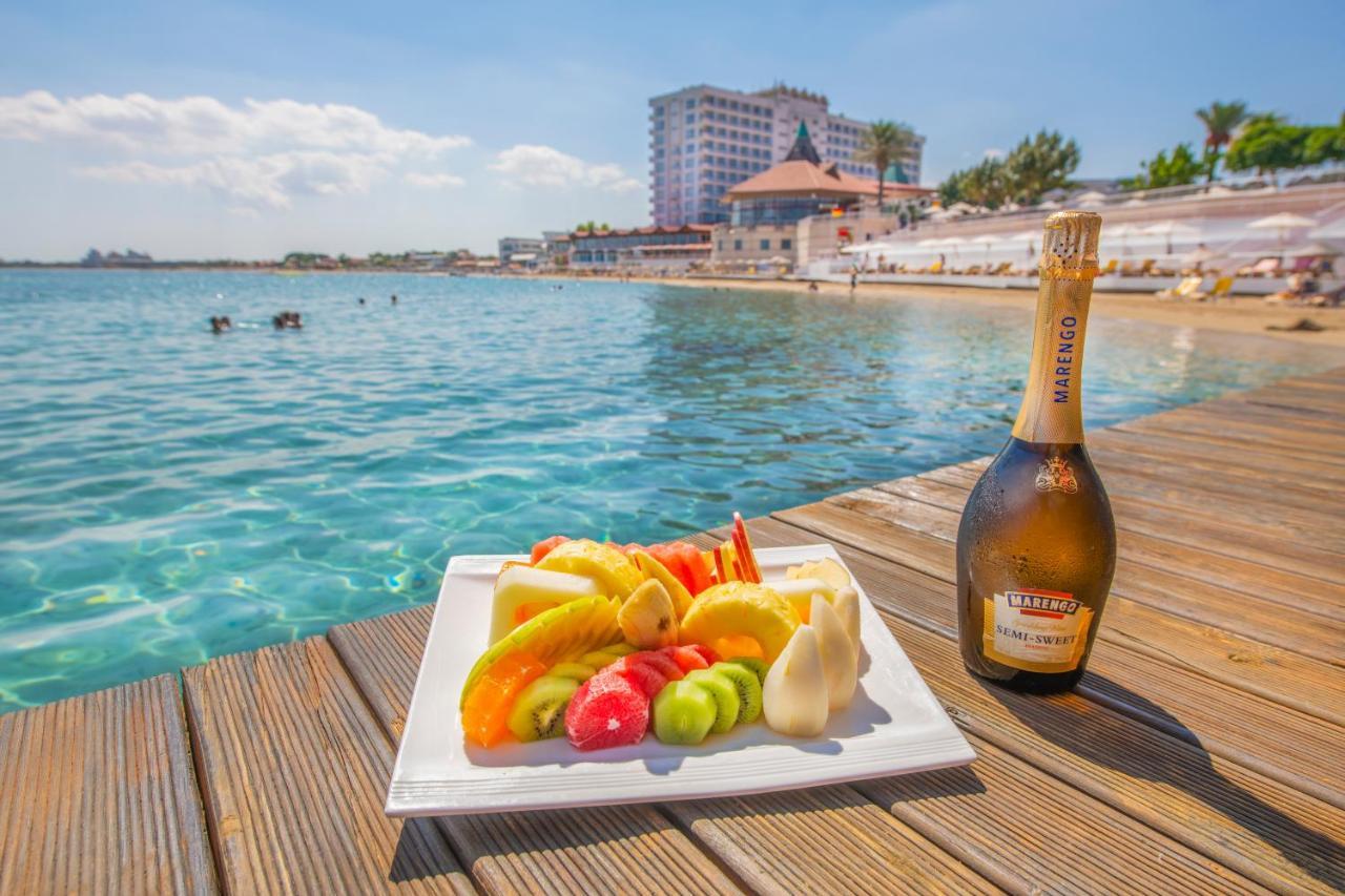 Salamis Bay Conti Resort Hotel & Casino Фамагуста Екстериор снимка A bottle of Milaneza sparkling wine